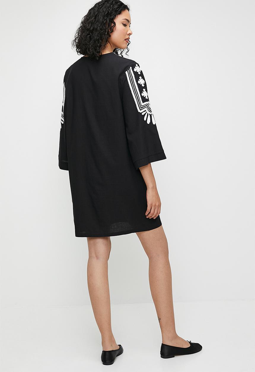 edit - Embroidery tunic with tassel trim - black/white