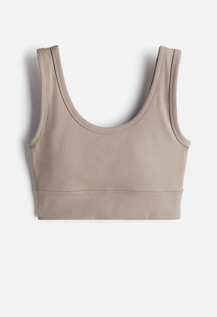 H&M - Softmove™ medium support sports bra - beige,grey