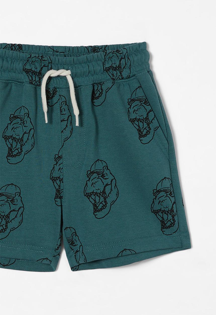 Cotton On - Henry slouch short - turtle green/dino cap yardage