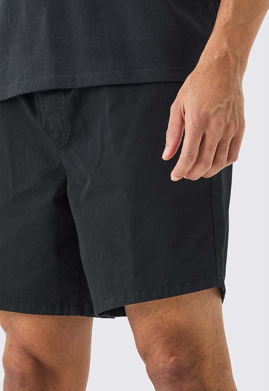 boohooMAN - Shorter Length Relaxed Fit Elasticated Waist Chino Shorts In Black - Black