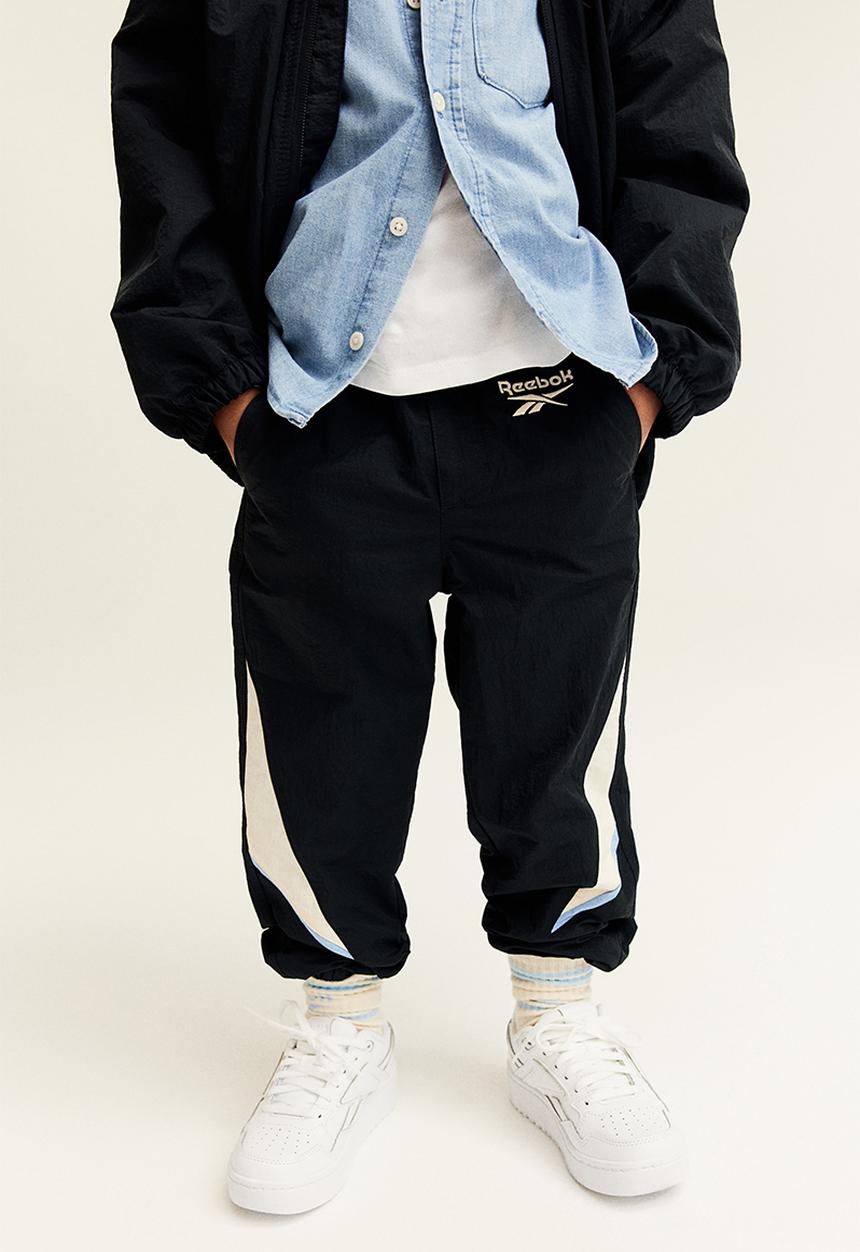 H&M - Reebok X H&M : Embroidered-detail nylon joggers - black