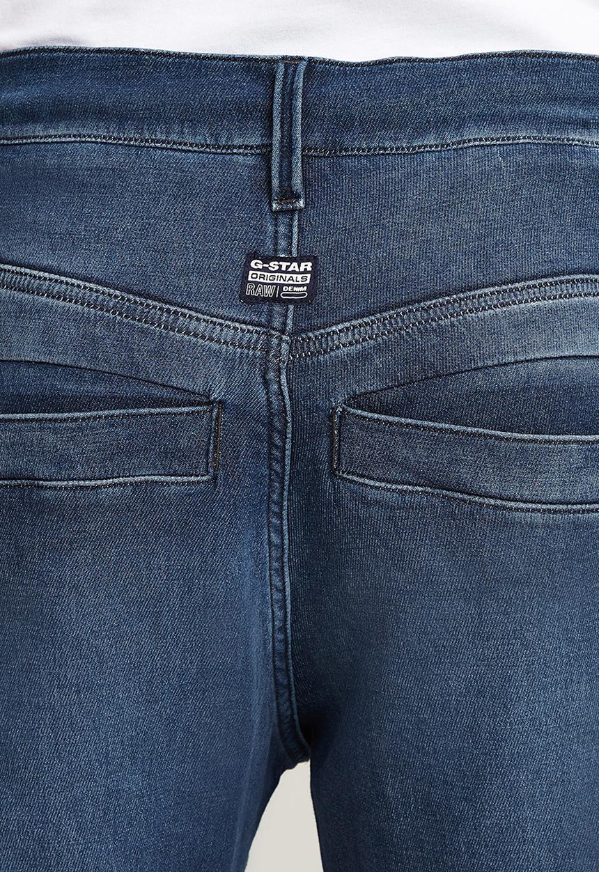 G-STAR - Denim trainer - worn in cloudy sky