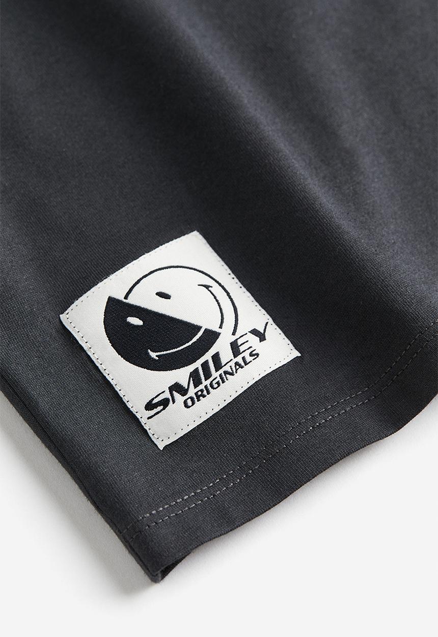 H&M - Oversized printed T-shirt - dark grey smiley®