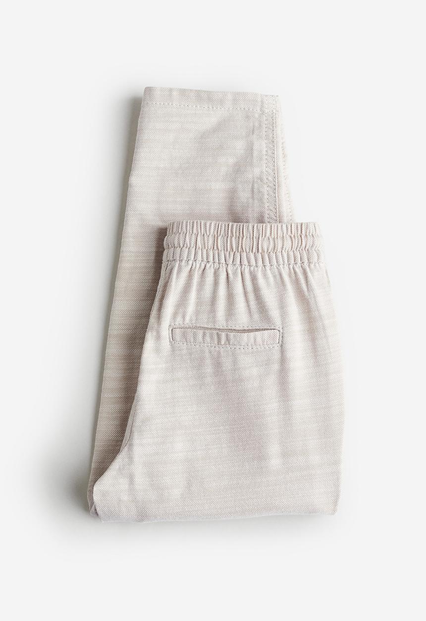 H&M - Loose fit roll-up trousers - light beige