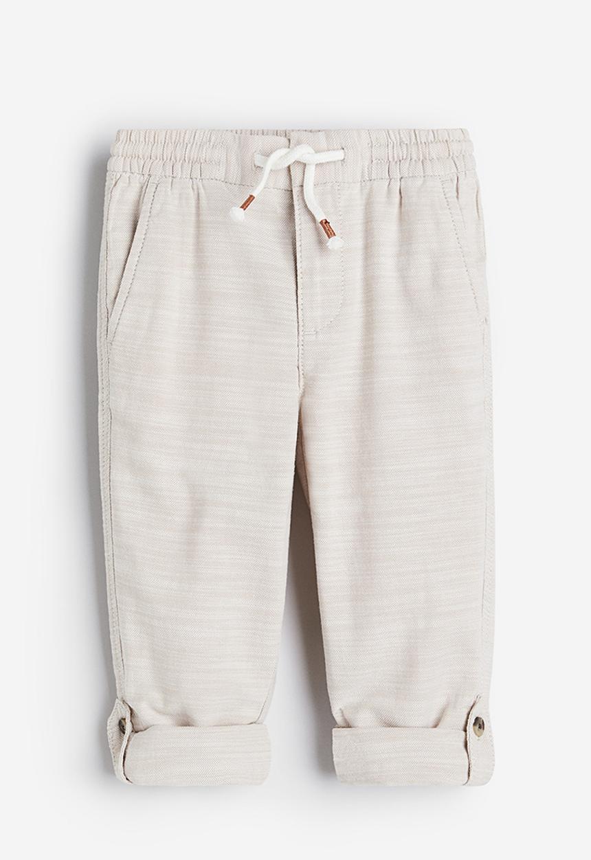 H&M - Loose fit roll-up trousers - light beige