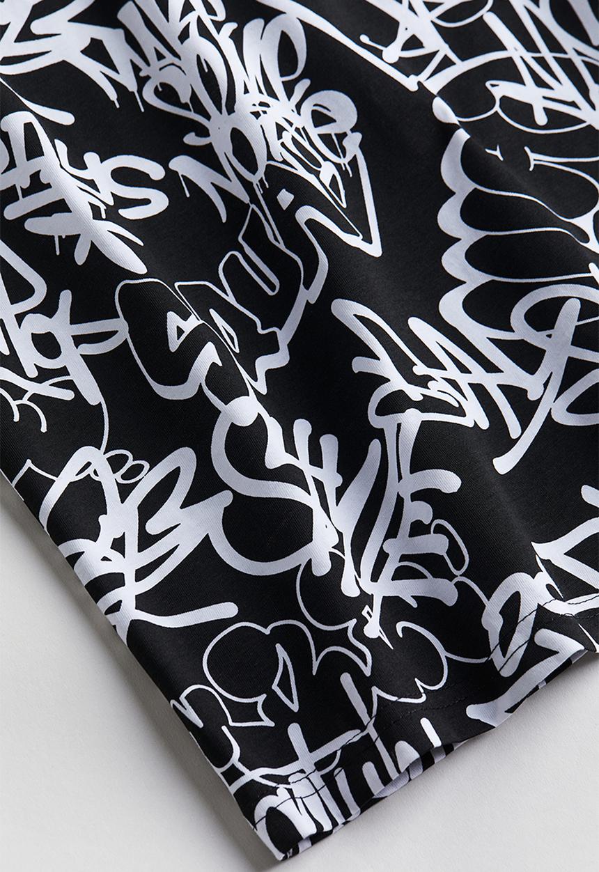 H&M - Printed cotton t-shirt - black & patterned
