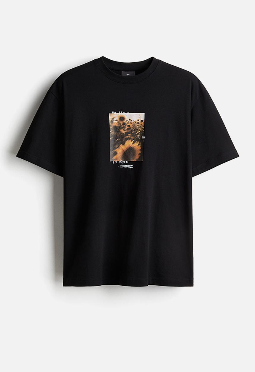 H&M - Loose fit printed T-shirt - black/sunflowers