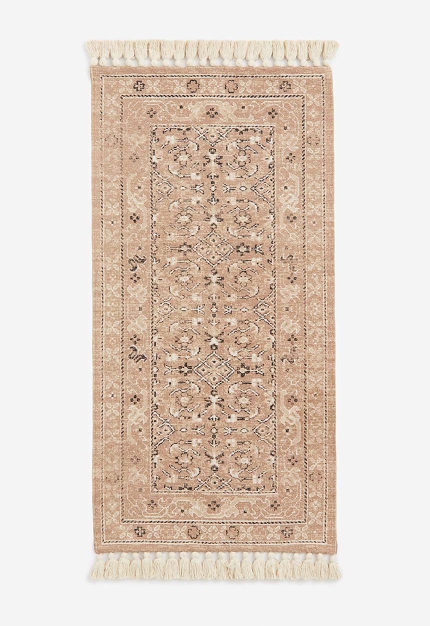 H&M - Fringed patterned rug - light pink patterned