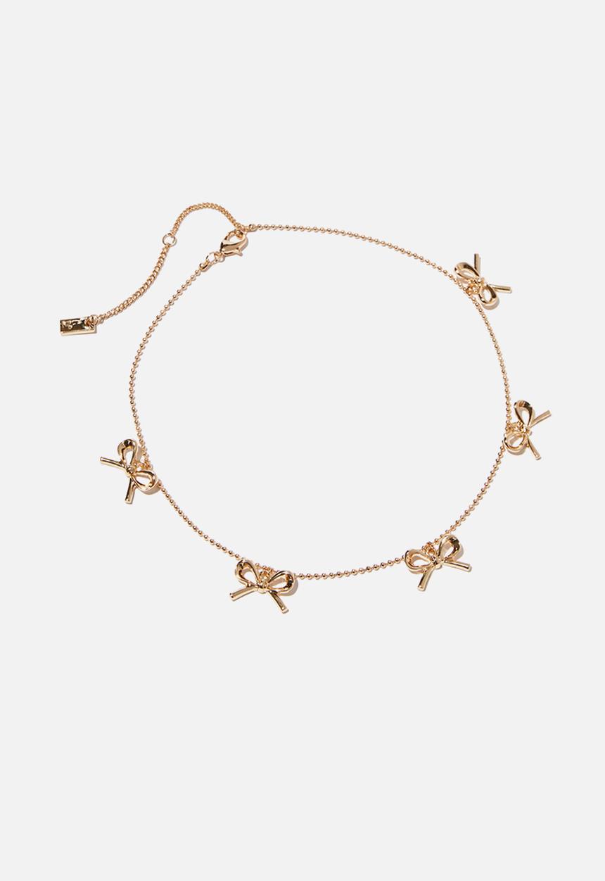 Rubi - Pendant necklace - up gold bows