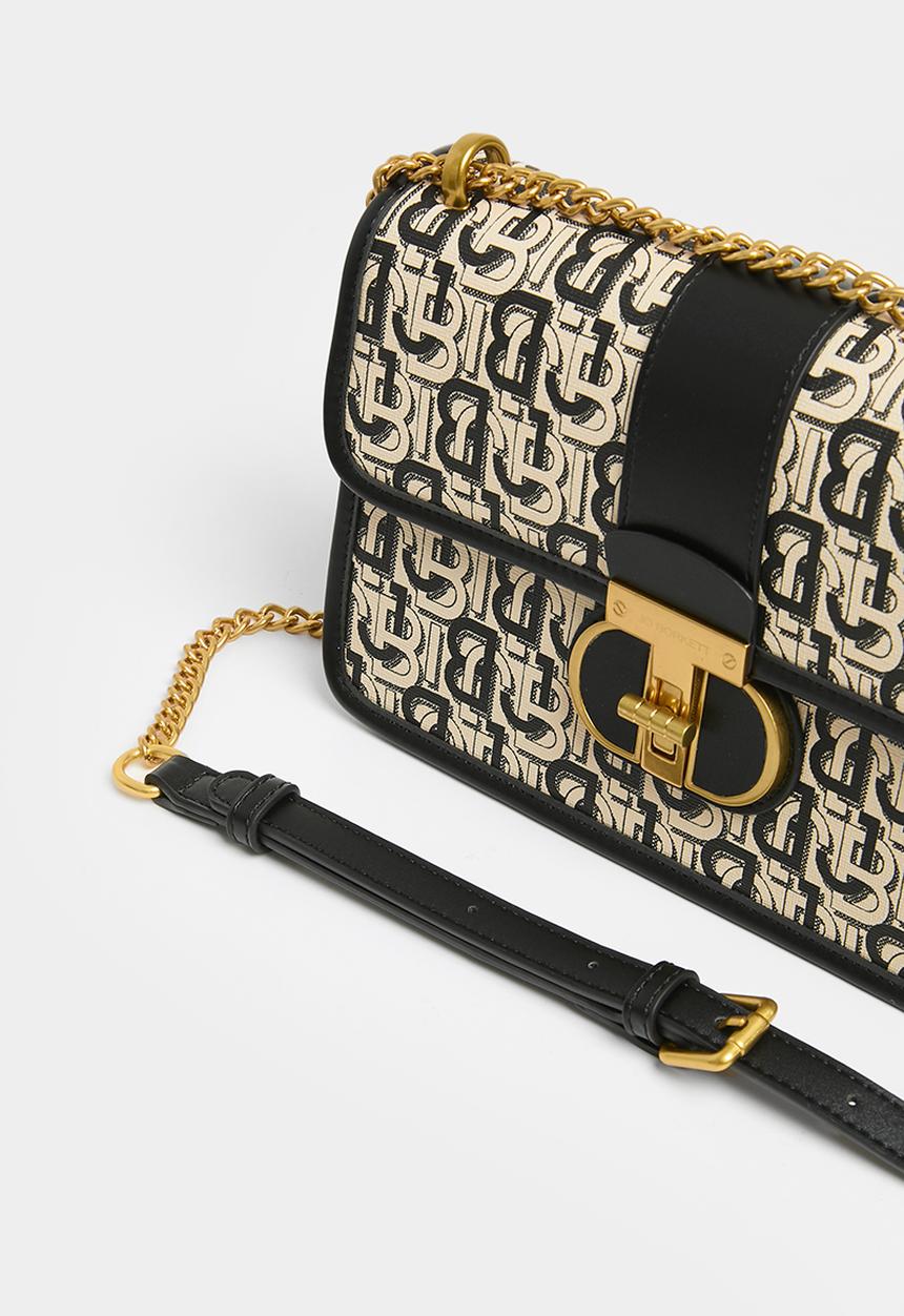 Jo Borkett - Monogram flapover sling - black & neutral