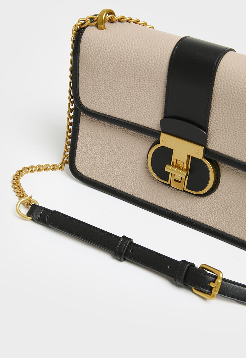 Jo Borkett - Monogram flapover sling - black & neutral