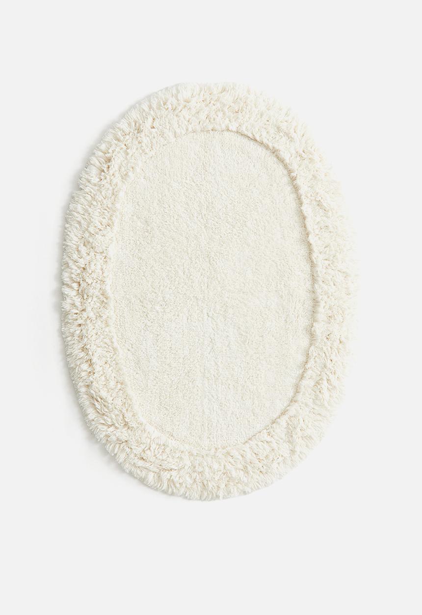 H&M - Oval tufted bath mat - white