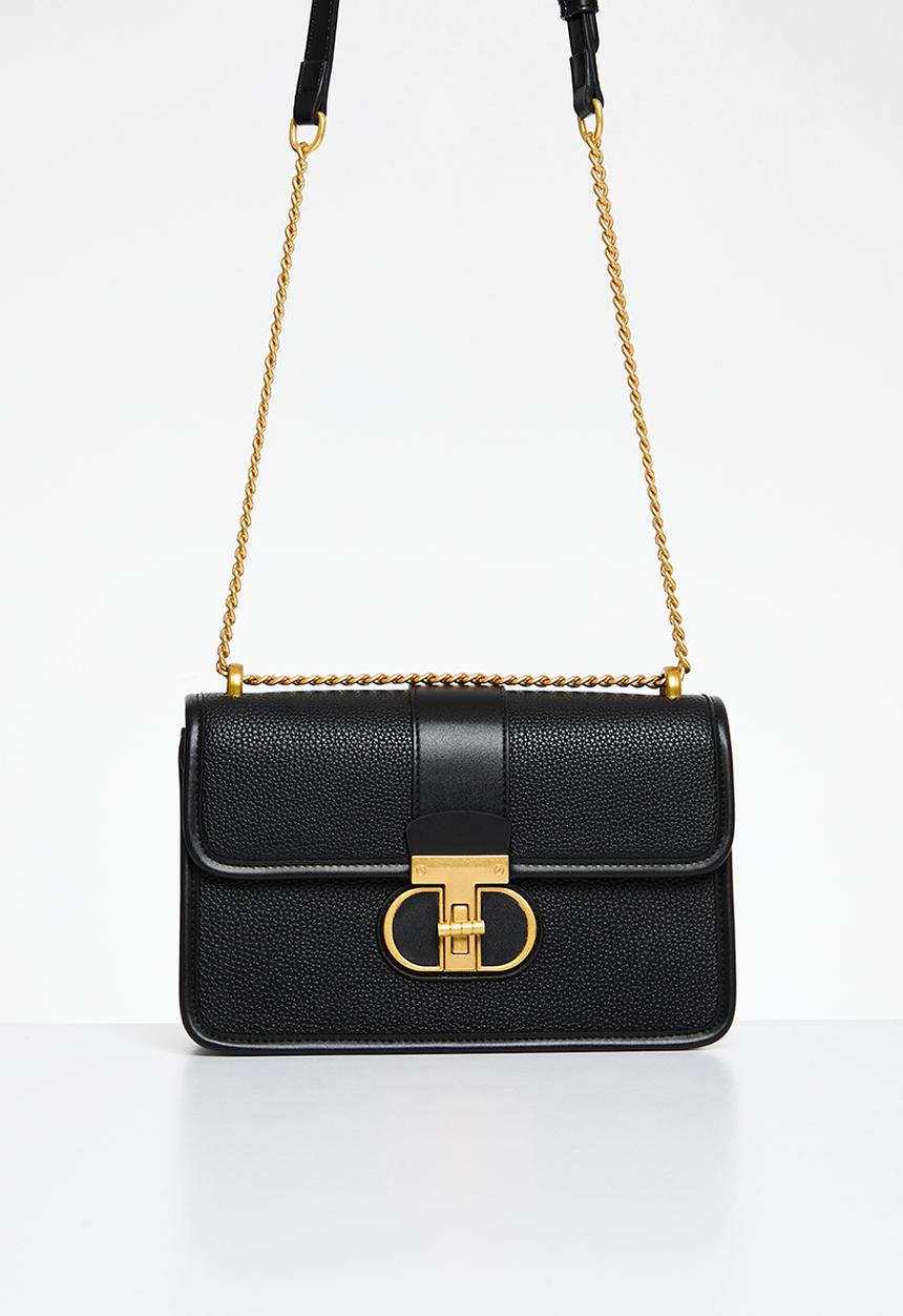 Jo Borkett - Monogram flapover sling - black