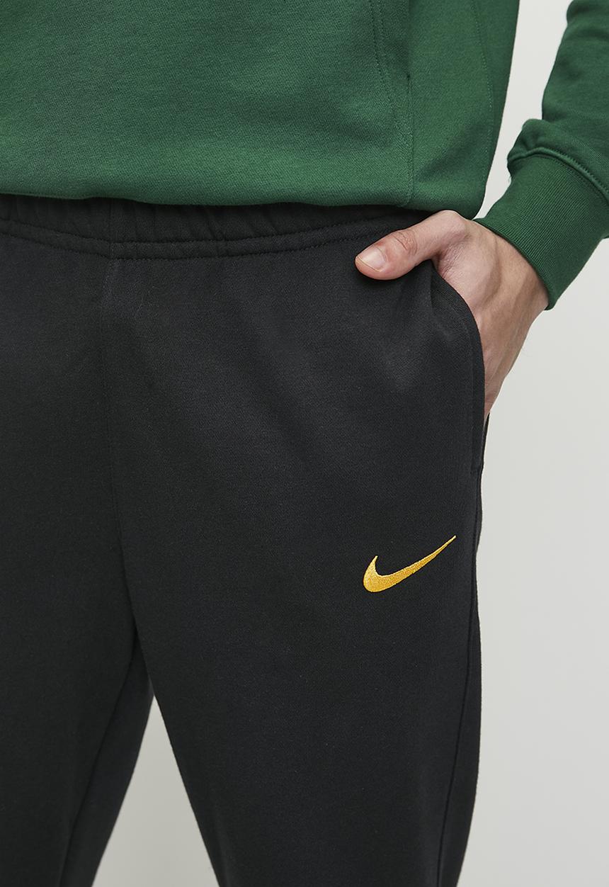 nike black and gold joggers
