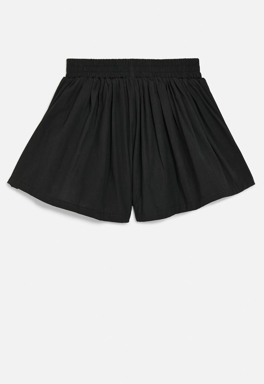 Pop Candy - Flared shorts - black