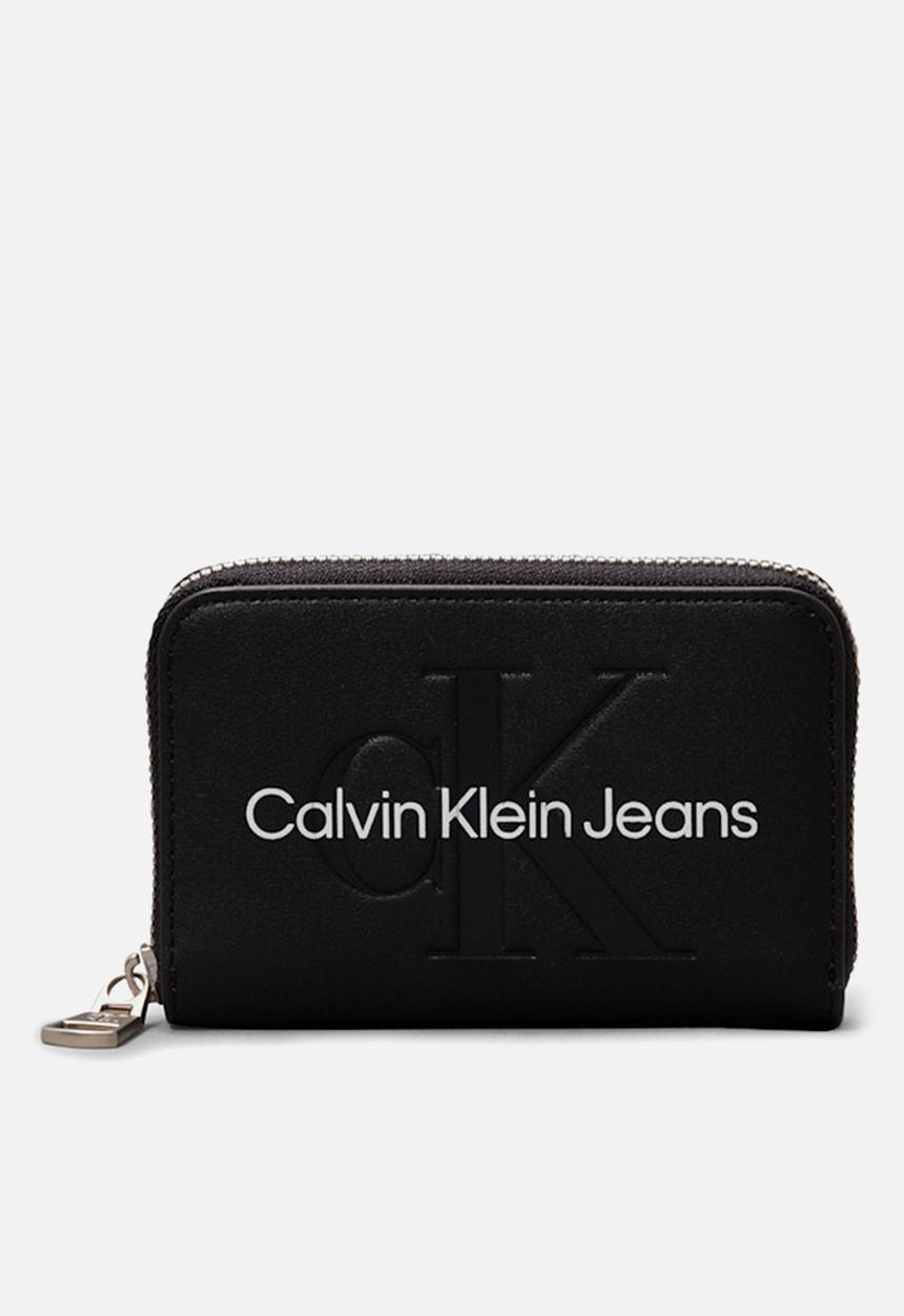 Calvin Klein - Scuplted medium zip around purse - black