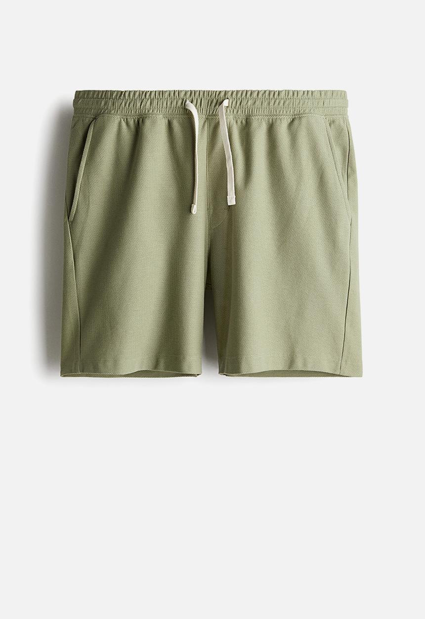 H&M - Regular fit piqué shorts - green