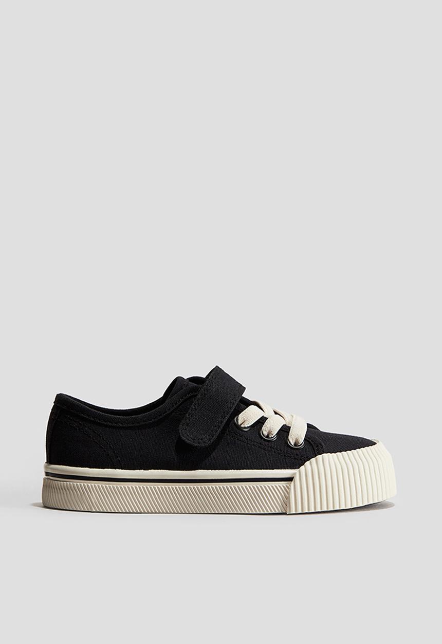 H&M - Keith Haring X H&M:  Cotton canvas trainers - black