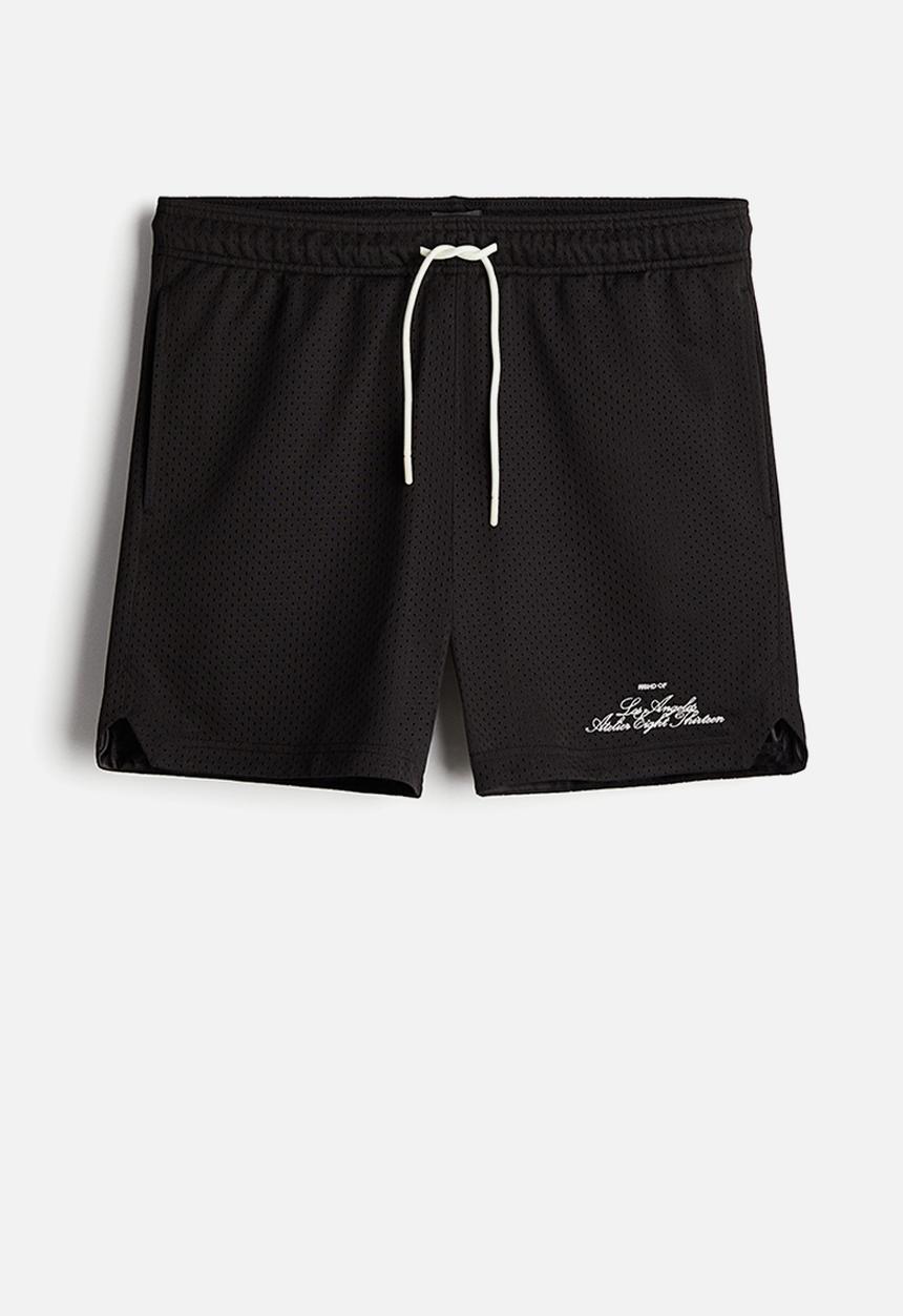 H&M - Regular fit mesh shorts - black