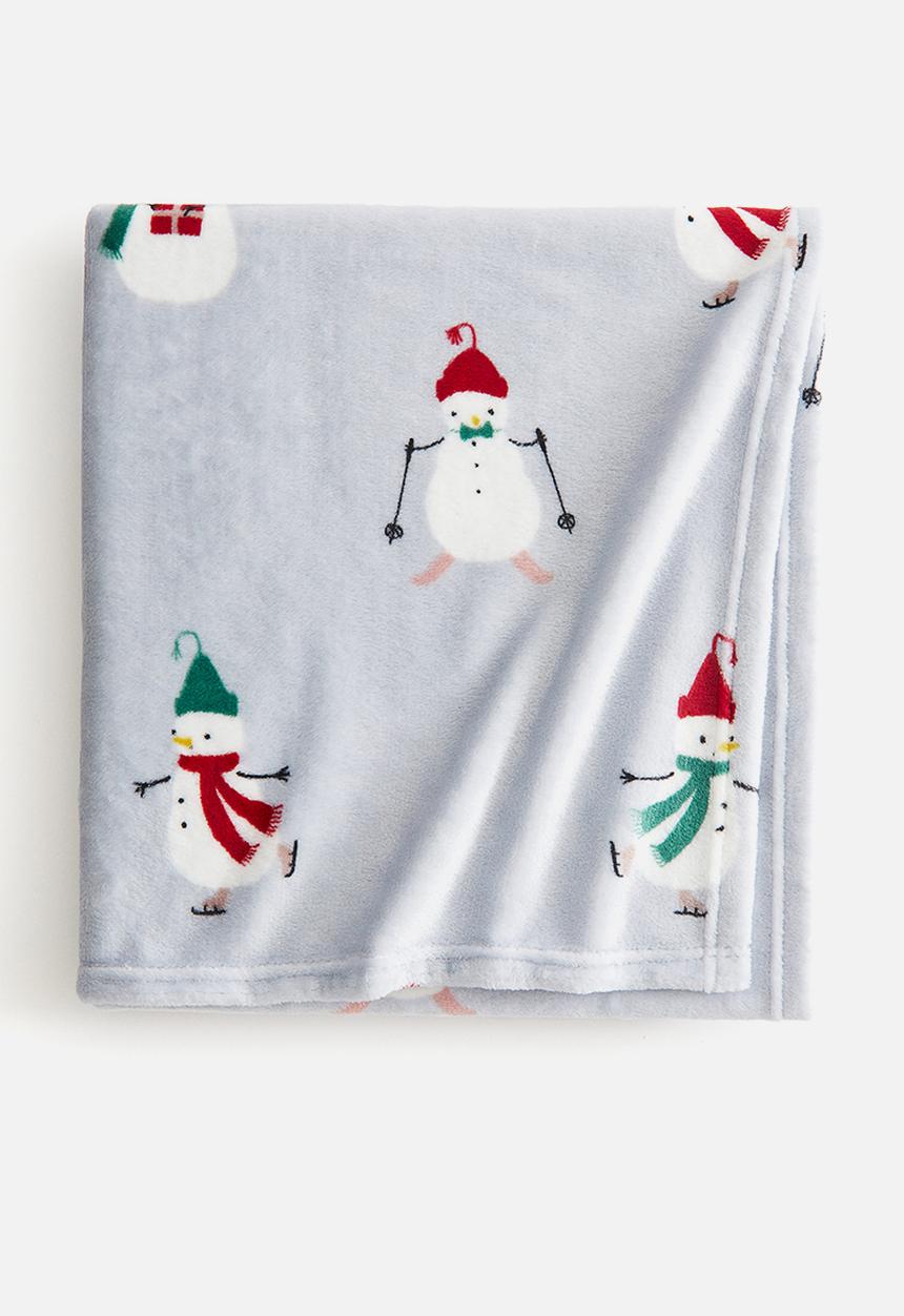 H&M - Patterned fleece blanket - light blue snowmen