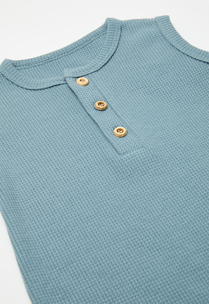 Pop Candy - Half button romper - light blue