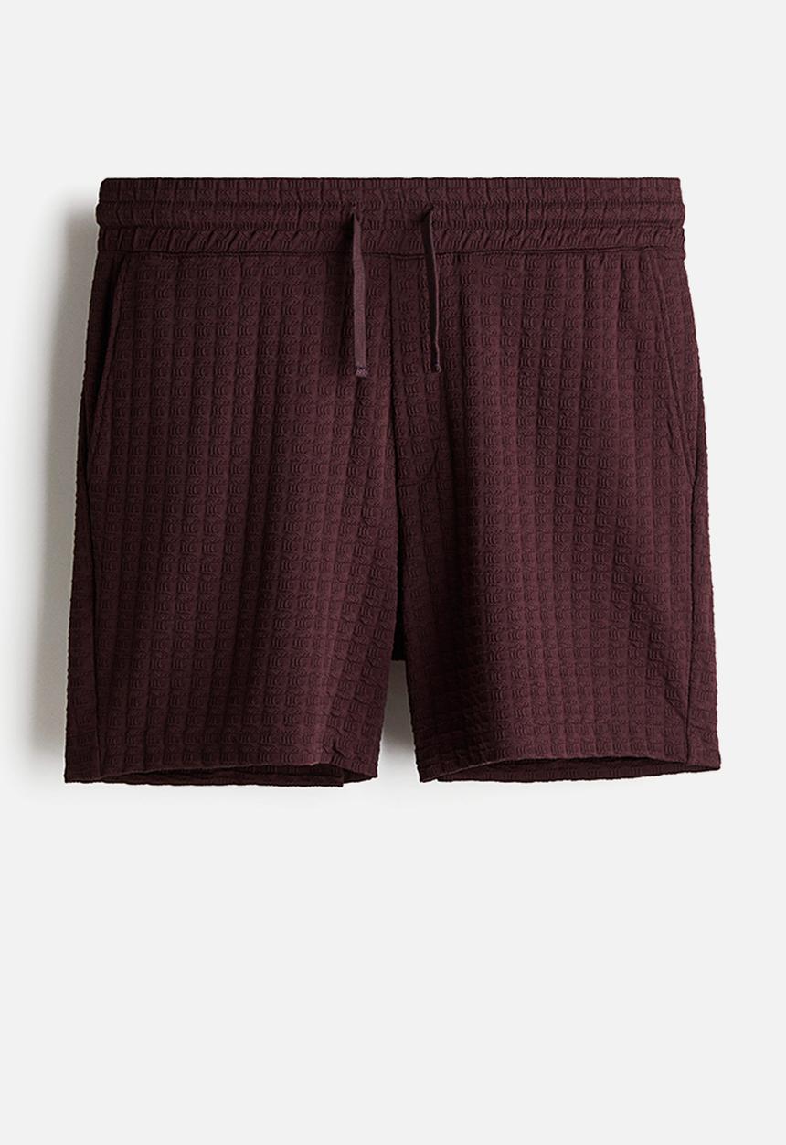 H&M - Regular fit textured sweatshorts - plum purple