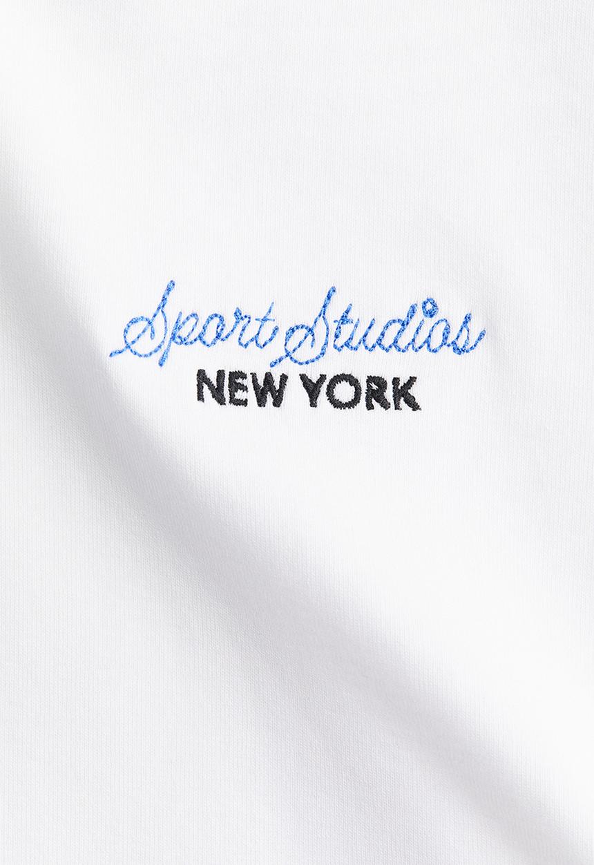 H&M - Fitted cotton T-shirt - white/sport studios 