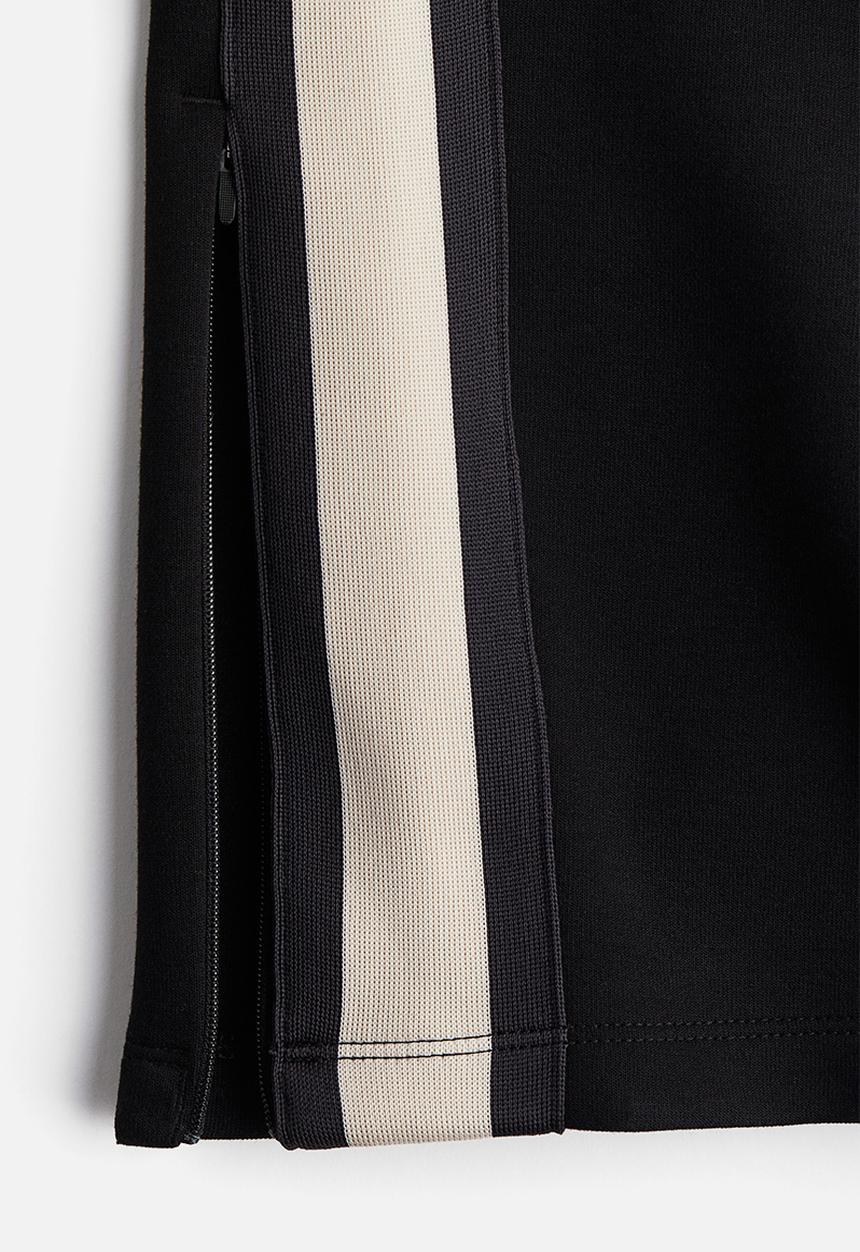 H&M - Regular fit track pants in drymove™ - black