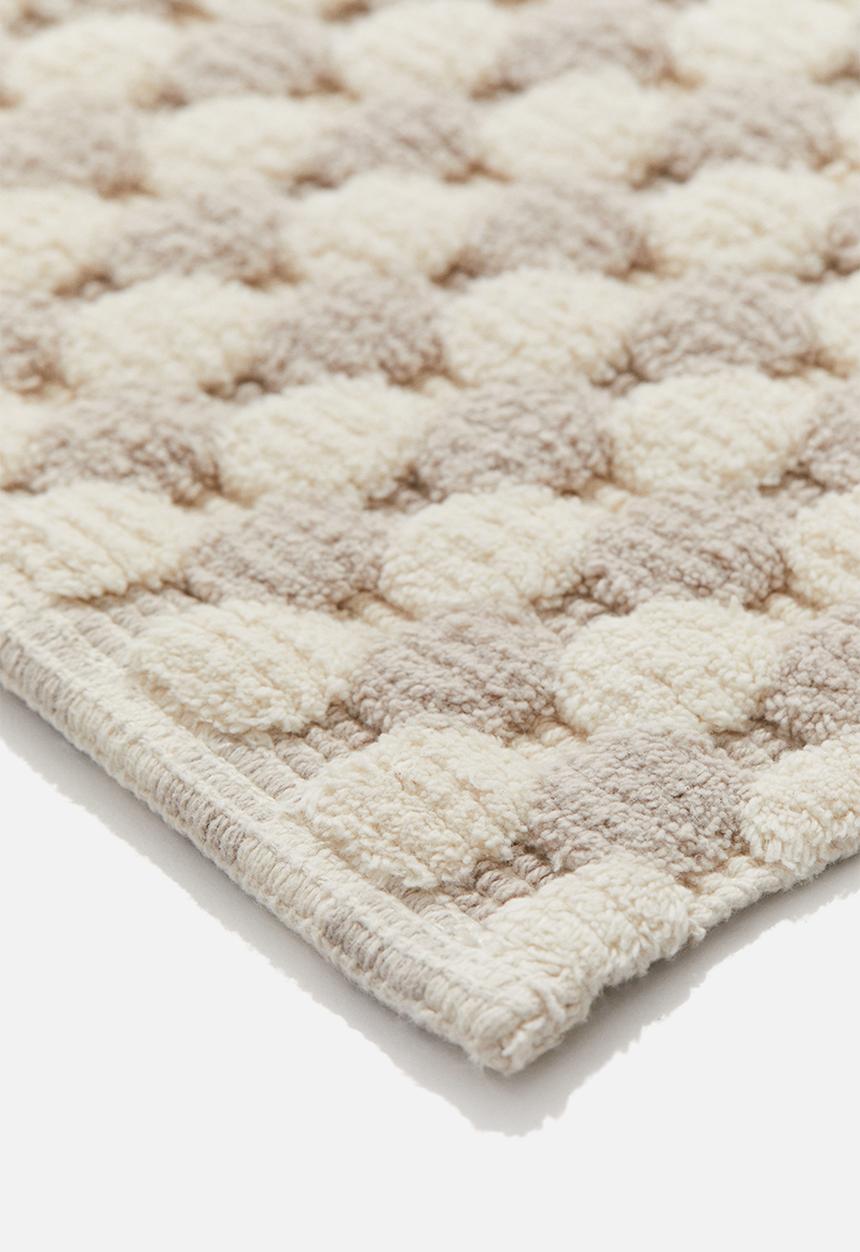 H&M - Patterned cotton bath mat - light mole spotted