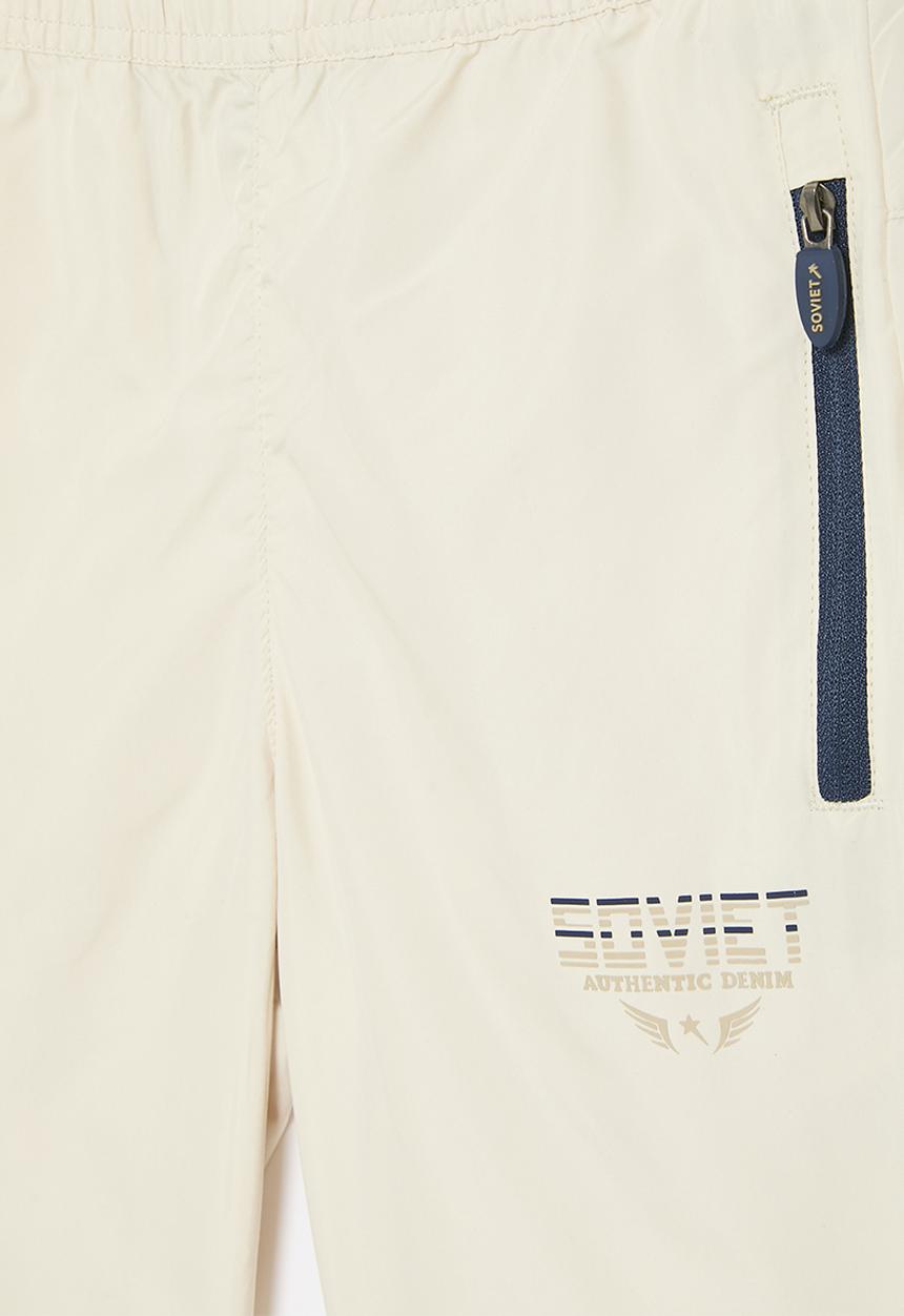 SOVIET - Boys track pants - ecru