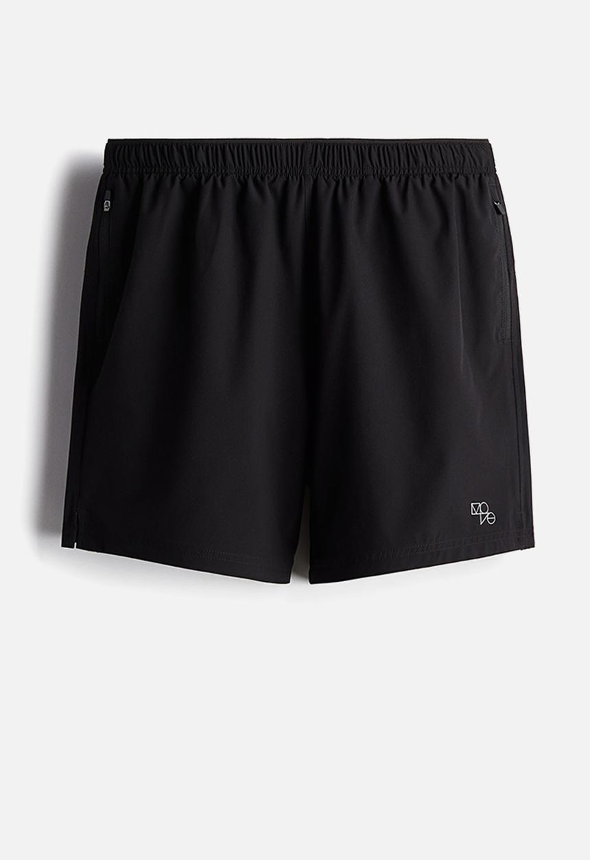H&M - Mid-length running shorts - black