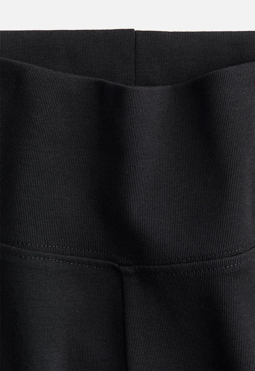 H&M - Flared leggings - black/ribbed