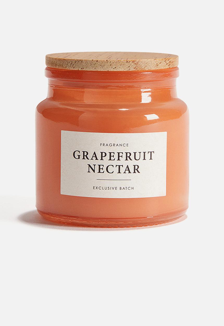 H&M - Scented candle in glass holder - orange/grapefruit nectar