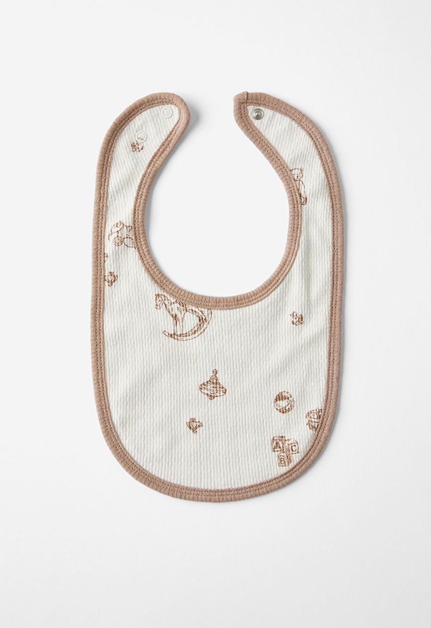 Cotton On - Organic pointelle bib - milk/vintage toys