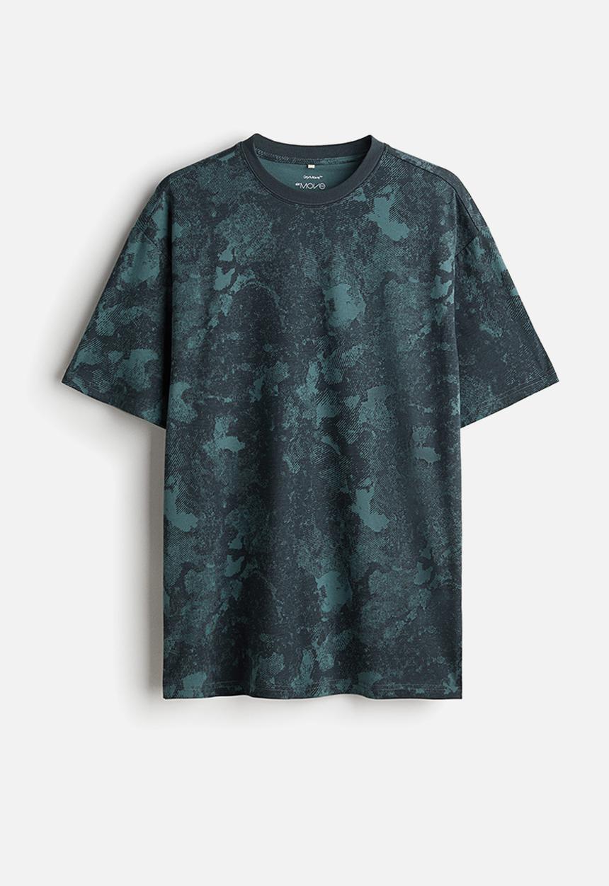 H&M - Loose fit sports top in drymove™ - teal/patterned 