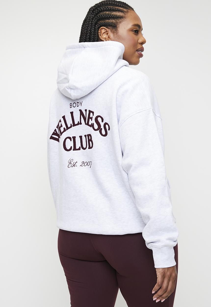 Cotton On - Plus Plush Premium Graphic Hoodie - Cloudy Grey Marle/Heritage Wellness Club
