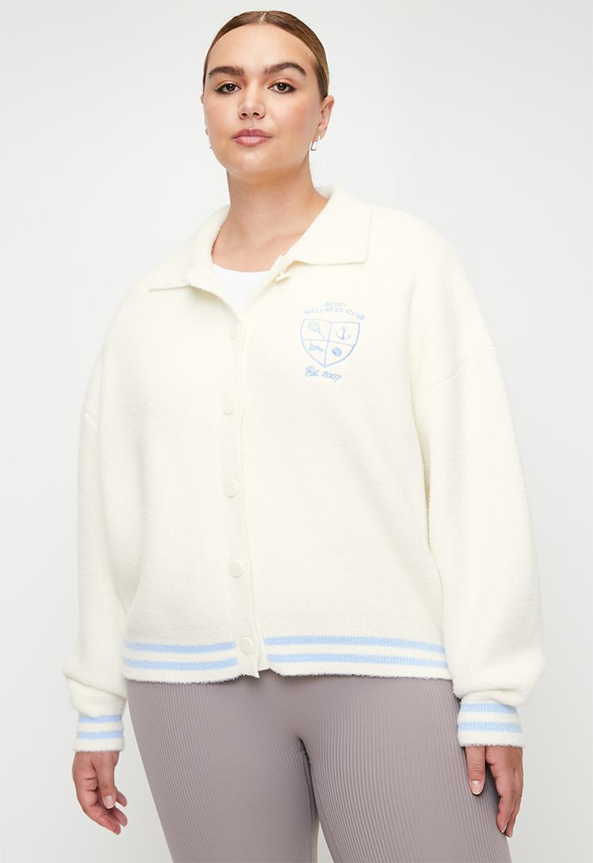 Cotton On - Plus Active Knitted Graphic Bomber - Coconut Milk/Heritage Club
