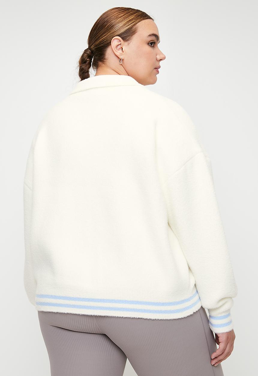 Cotton On - Plus Active Knitted Graphic Bomber - Coconut Milk/Heritage Club