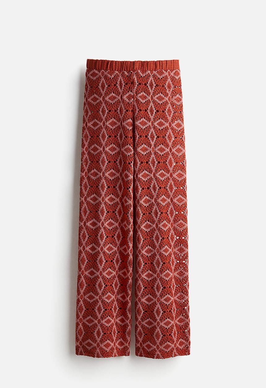 H&M - THE WHITE LOTUS H&M - Crocheted trousers - orange patterned 