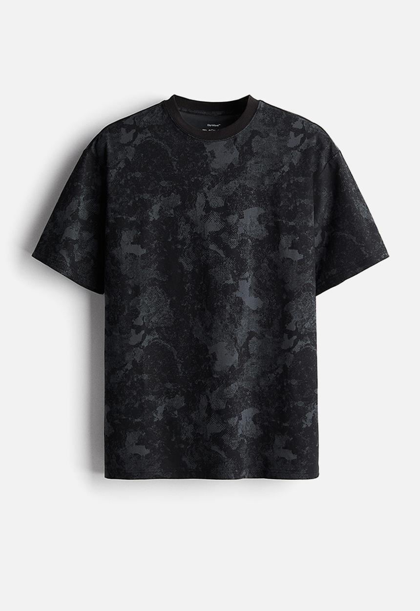 H&M - Loose fit sports top with drymove™ - black patterned