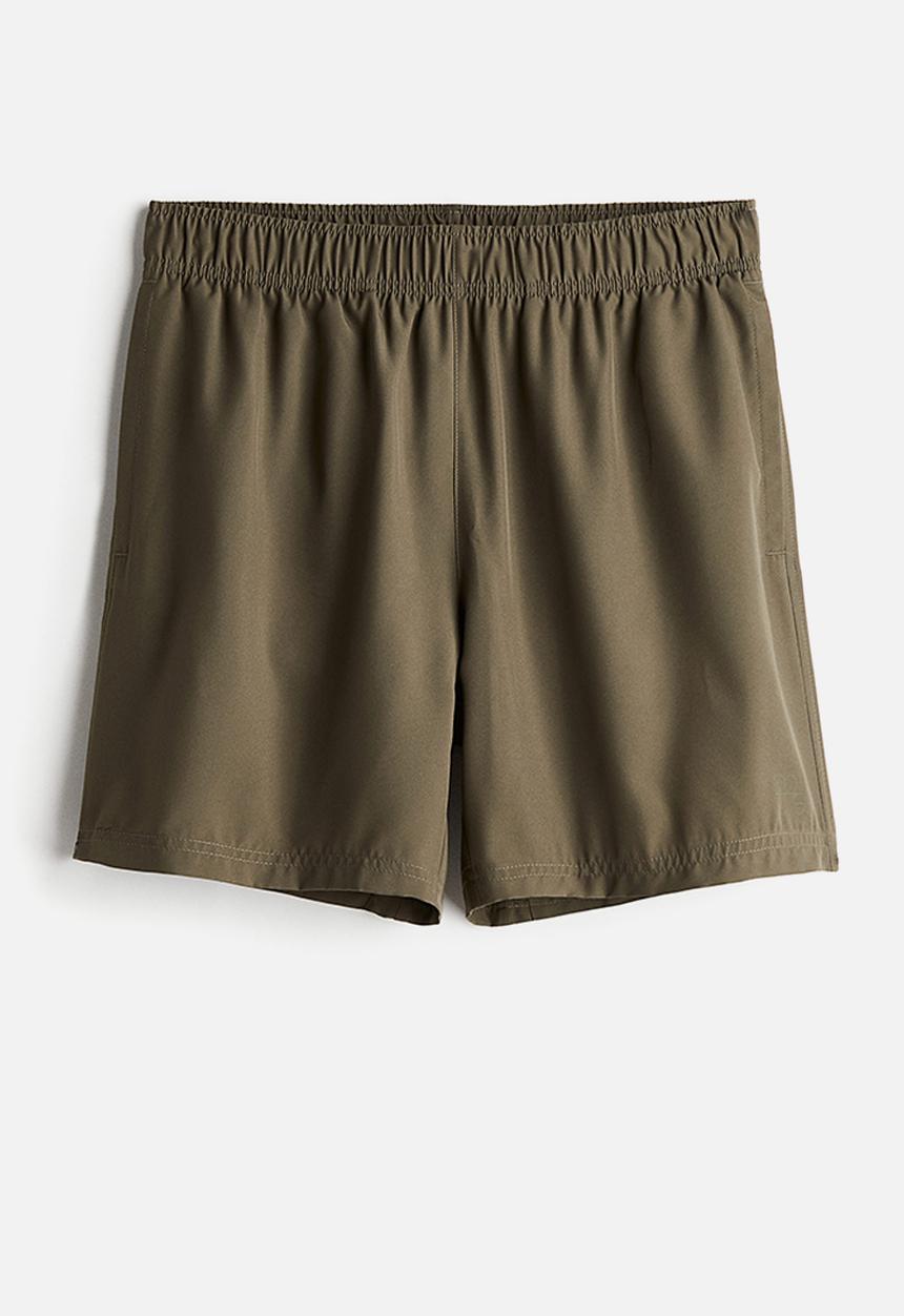H&M - Drymove™ woven sports shorts with pockets - green