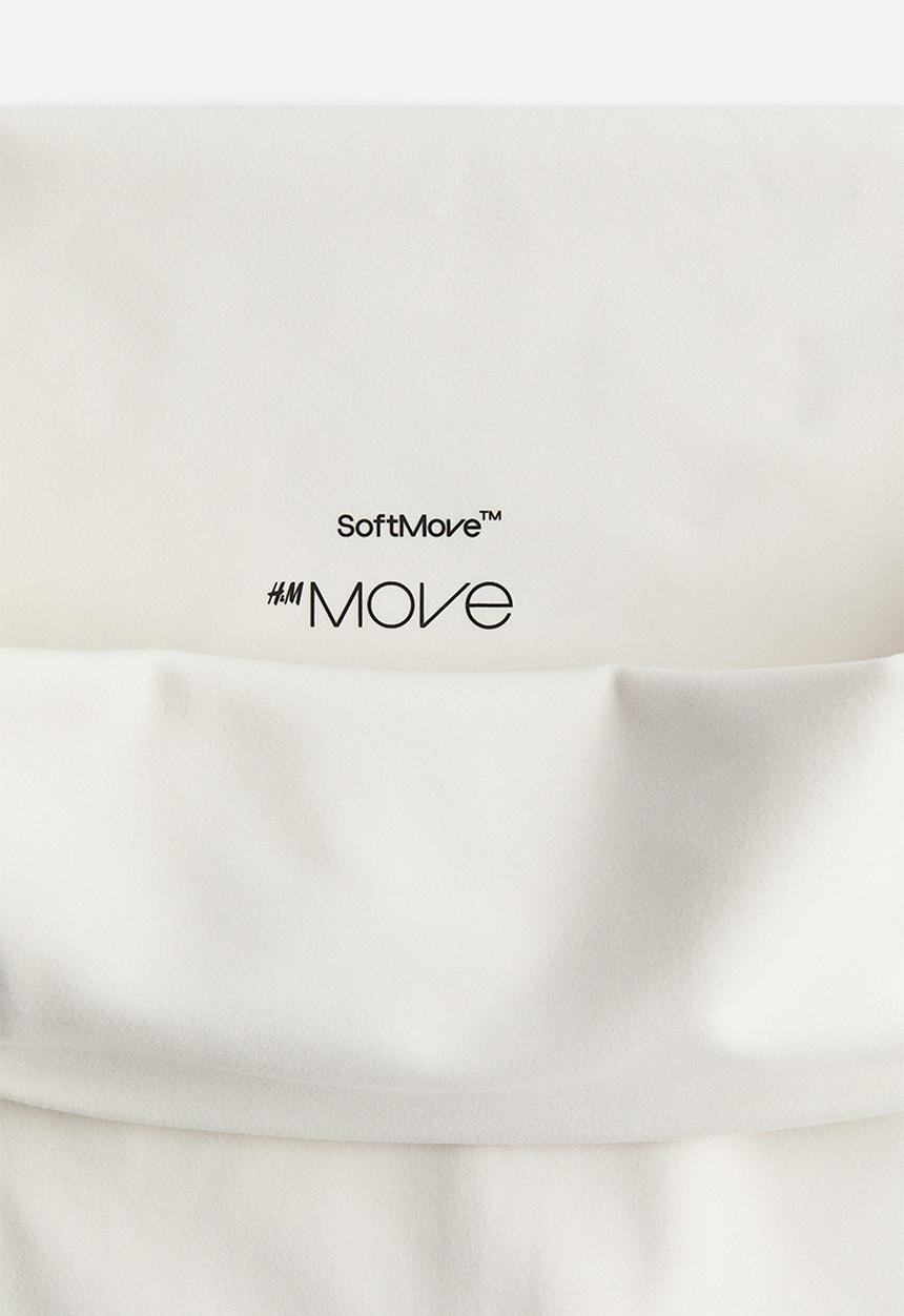 H&M - Flared yoga leggings in softmove™ - white