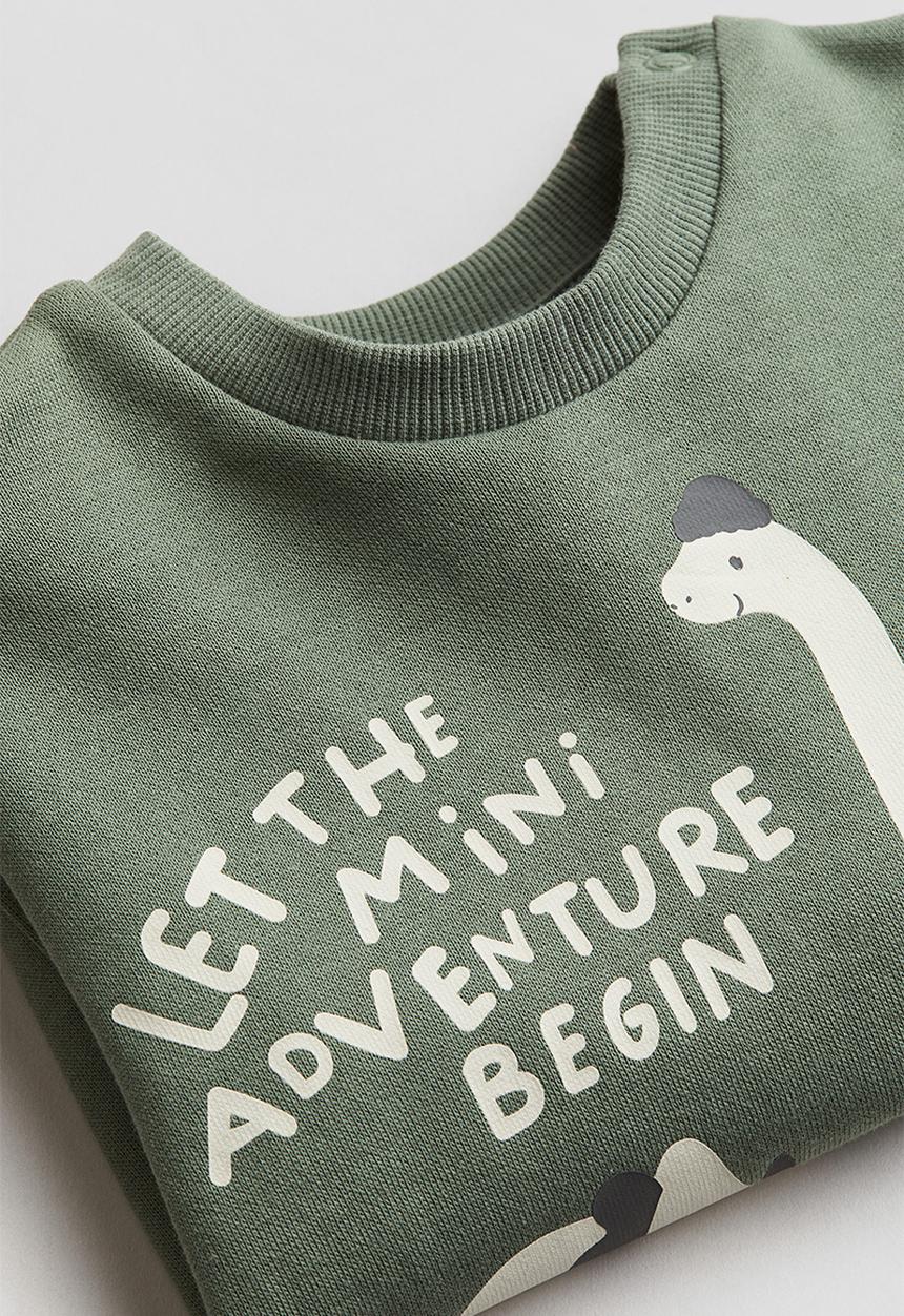 H&M - Printed sweatshirt - khaki green dinosaurs