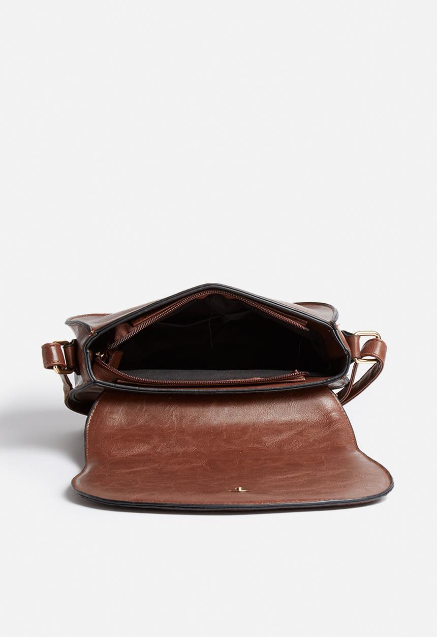 The Lot - Fold & fade slingbag