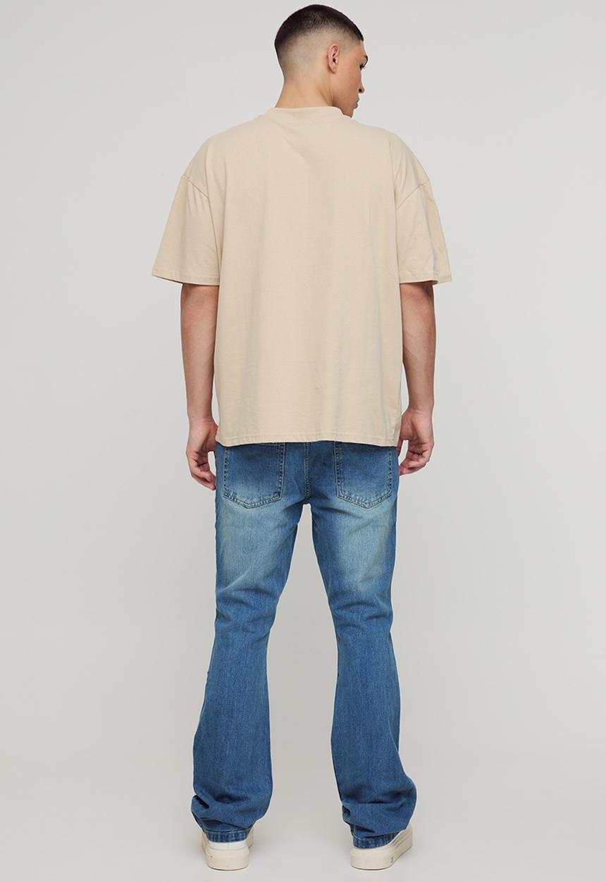 boohooMAN - Slim Rigid Flare Jean - Mid Blue