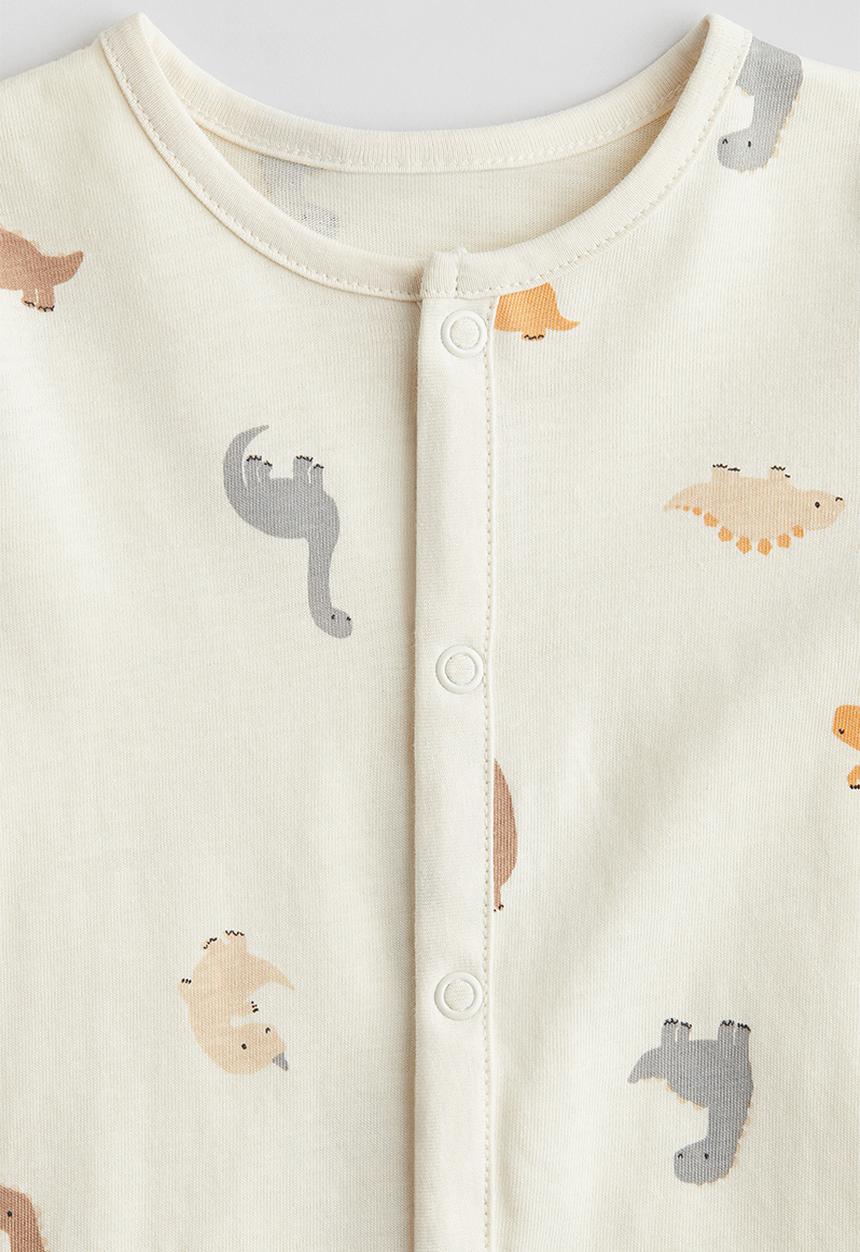 H&M - Patterned sleepsuit - cream dinosaurs