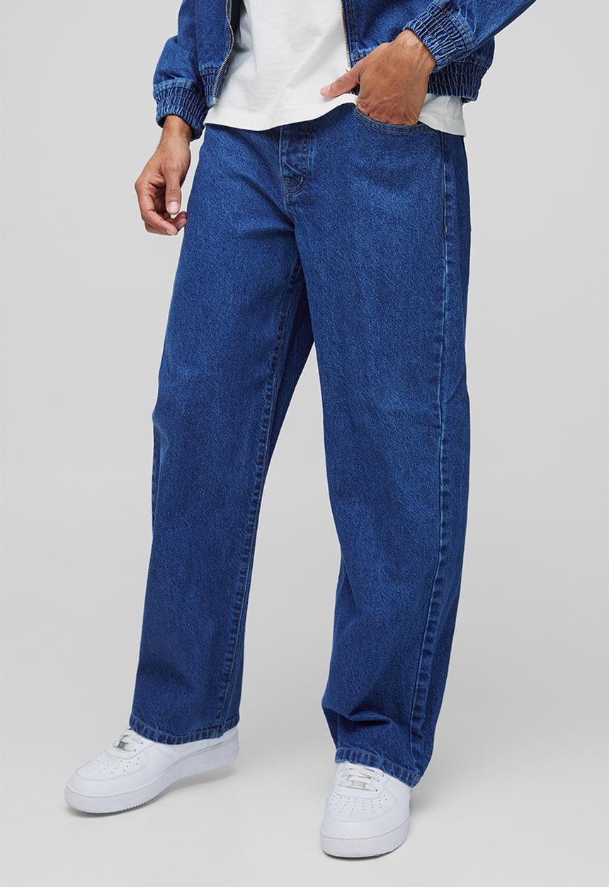 boohooMAN - Embroidered Relaxed Fit Jeans - Mid Blue