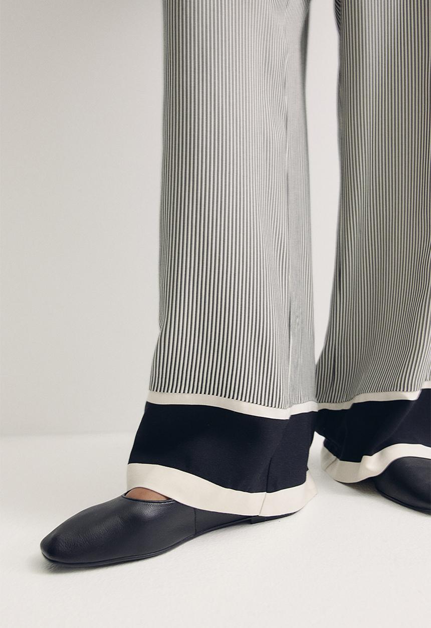 H&M - Straight trousers - black striped 