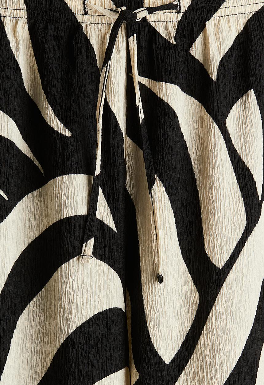 H&M - Textured jersey drawstring trousers - black patterned