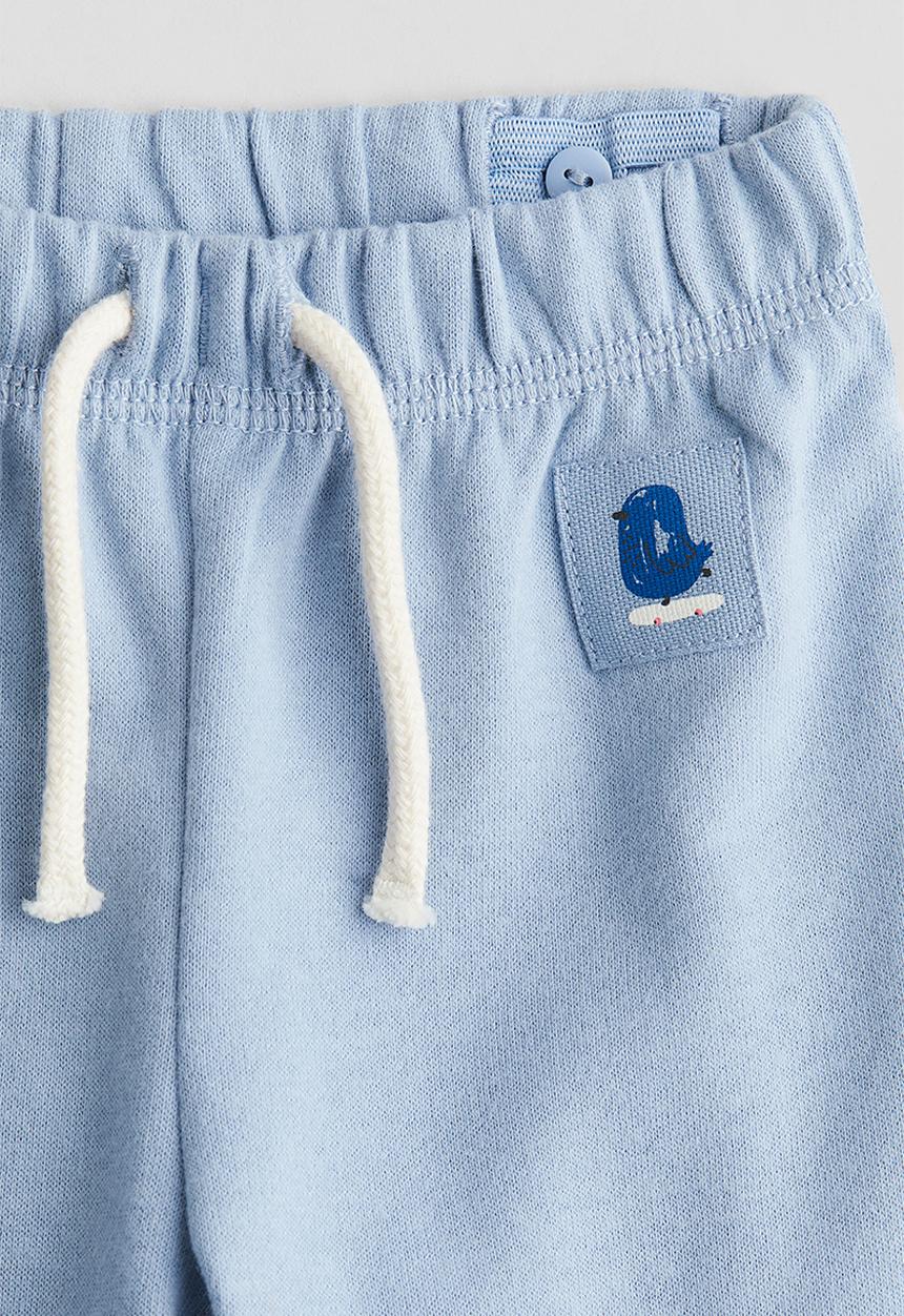 H&M - Cotton joggers - light dusty blue bird